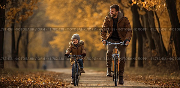 A young father and a little boy ride bicycles along the empty paths of an autumn park in the early morning. Generated by AI. Стоковое AI-изображение, AI-художник Ярославский Максим / Фотобанк Лори