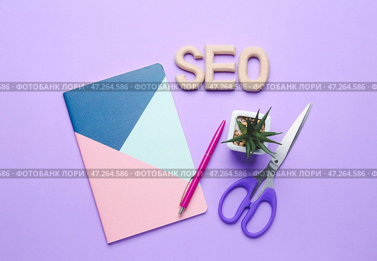 Аббревиатура SEO с бланками на цветном фоне. Стоковое фото, фотограф Pixel_shot / Фотобанк Лори