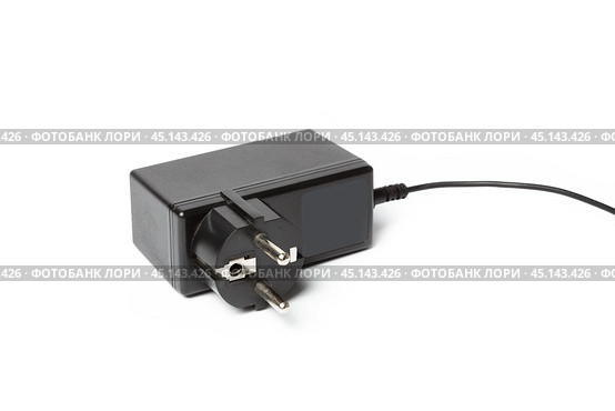 AC adapter isolated on white. Стоковое фото, фотограф Сергей Толмачёв / Фотобанк Лори
