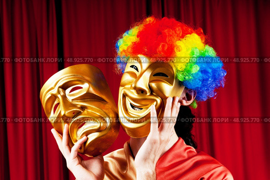 Actor with maks in a funny theater concept. Стоковое фото, агентство Ingram Publishing / Фотобанк Лори