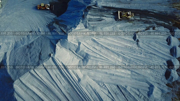 Aerial view of big career with excavators and trucks at work, heavy industry and extraction of minerals concept. Стоковое фото, фотограф David Kashakhi / Фотобанк Лори