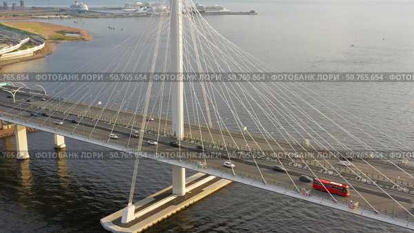 Aerial view of cable-stayed bridge with cars. Стоковое фото, фотограф Михаил Коханчиков / Фотобанк Лори