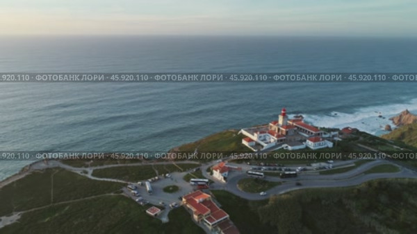 Aerial view of lighthouse at Cape Roca in Portugal (2019 год). Стоковое видео, видеограф Михаил Коханчиков / Фотобанк Лори
