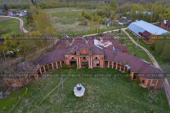 Aerial view of the old building of the stables of Count Stroganov's stud farm on a May day. Volyshevo. Pskov region, Russia (2022 год). Стоковое фото, фотограф Виктор Карасев / Фотобанк Лори