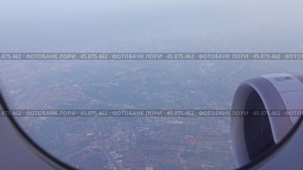 Aerial view on Bangkok city from plane. Стоковое видео, видеограф Михаил Коханчиков / Фотобанк Лори