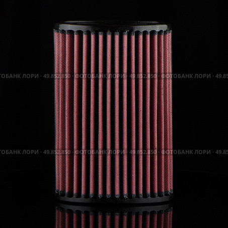 Air cone filter on black background. Vehicle Modification Accessories. Стоковое фото, агентство Ingram Publishing / Фотобанк Лори