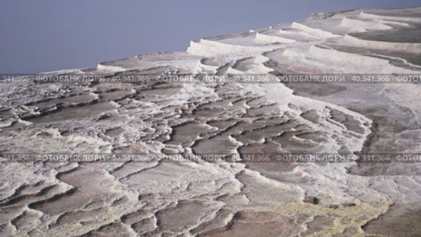 Amazing landscape of Pamukkale thermal springs with cascade of white calcite terraced baths, Turkey. Стоковое видео, видеограф Яков Филимонов / Фотобанк Лори