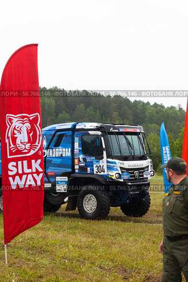 ANGARSK, IRKUTSK REGION, RUSSIA - July 13, 2025: XV International Silk Way Rally, racing competition. Entry to start of famous sports truck No.304 KAMAZ master team of Karimov Bogdan. Редакционное фото, фотограф Виктория Катьянова / Фотобанк Лори