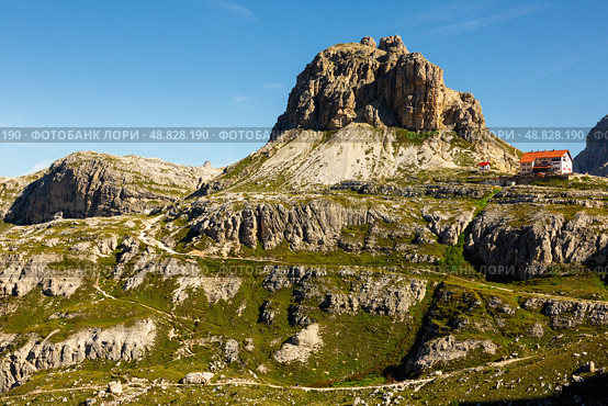 Antonio Locatelli hut at foot of rocky Sasso di Sesto peak in Dolomites. Стоковое фото, фотограф Яков Филимонов / Фотобанк Лори
