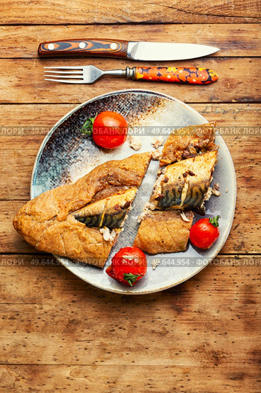 Appetizing food, scomber baked in spicy dough.. Mackerel baked in bread loaf. Стоковое фото, агентство Ingram Publishing / Фотобанк Лори