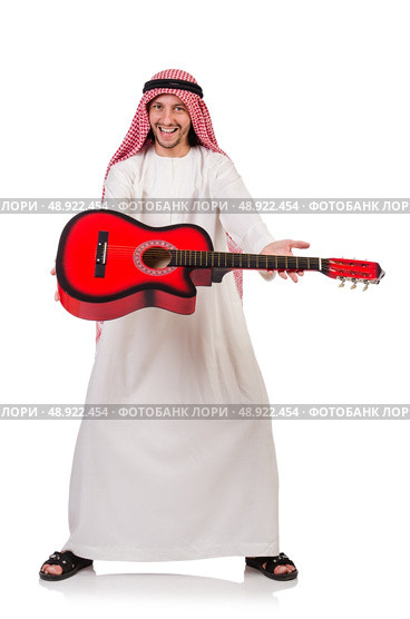 Arab man playing guitar isolated on white. Стоковое фото, агентство Ingram Publishing / Фотобанк Лори
