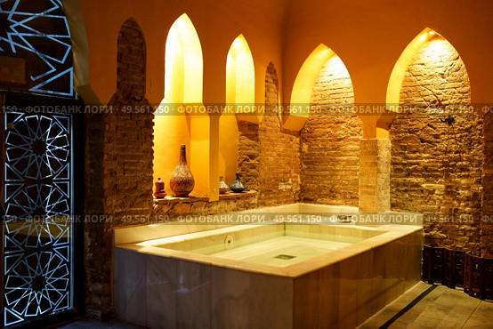 Arabic baths Hammam in Granada, Andalusia, Spain. Elvira baths. Cold water pool.. Arabic baths Hammam in Granada, Andalusia, Spain. Стоковое фото, агентство Ingram Publishing / Фотобанк Лори