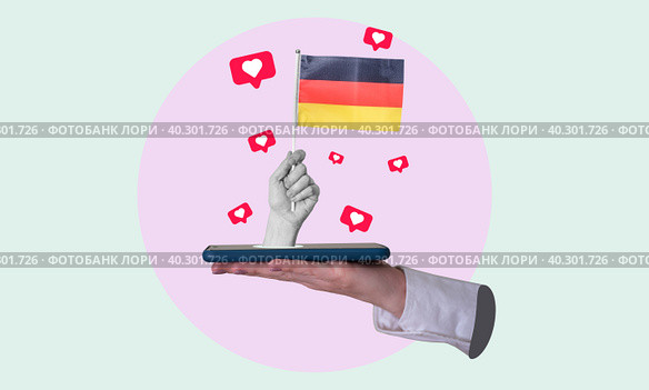 Art collage, collage of a hand holding the German flag, microphone in the other hand. Стоковое фото, фотограф Григорий Алехин / Фотобанк Лори