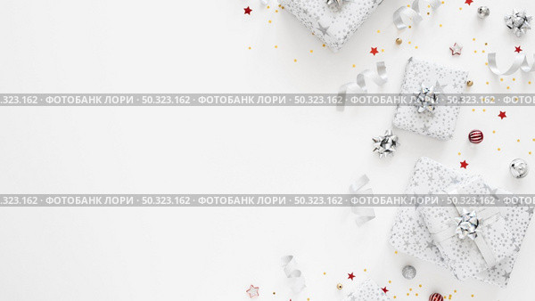 assortment of festive wrapped presents with copy space. Стоковое фото, агентство Ingram Publishing / Фотобанк Лори