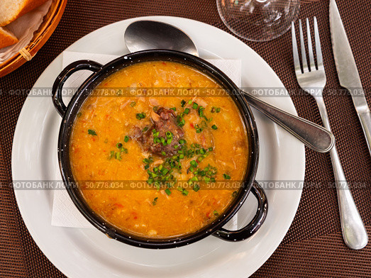 Asturian rich beans stew Fabada with pork shoulder, morcilla and chorizo. Стоковое фото, фотограф Яков Филимонов / Фотобанк Лори