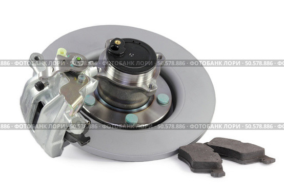 auto parts. brake mechanism for a car on a white background. hub, pads, disk. Стоковое фото, агентство Ingram Publishing / Фотобанк Лори
