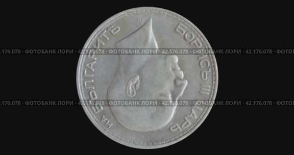 Аверс монеты Болгарии 50 левов 1934 года с портретом царя Бориса на черном фоне. Obverse of Bulgaria coin 50 leva 1934 with portrait of tsar Boris, isolated in black background. 3d animation in 4k video. Стоковая анимация, аниматор Александр Кузнецов / Фотобанк Лори