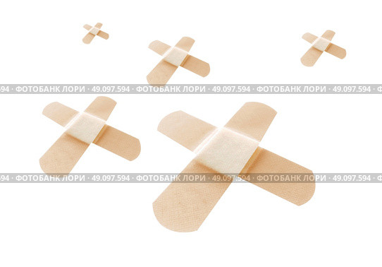 Bandages on white. Стоковое фото, агентство Ingram Publishing / Фотобанк Лори