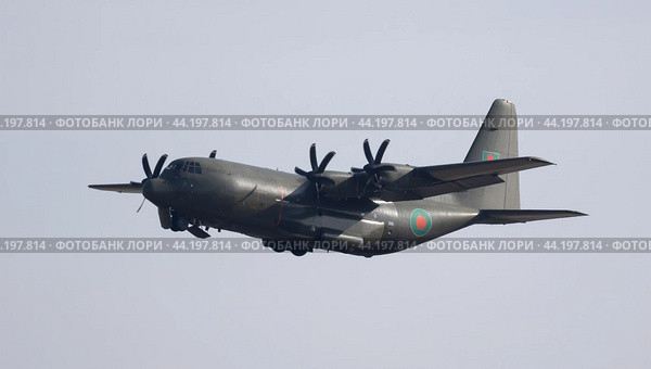 Barcelona, Spain - August 18, 2023: Bangladesh Airlines plane Lockheed Martin C-130J Super Hercules takes off from runway at Barcelona Airport. Редакционное фото, фотограф Яков Филимонов / Фотобанк Лори