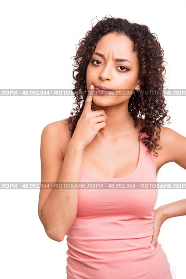 Beautiful african woman thinking over white background . Стоковое фото, агентство Ingram Publishing / Фотобанк Лори