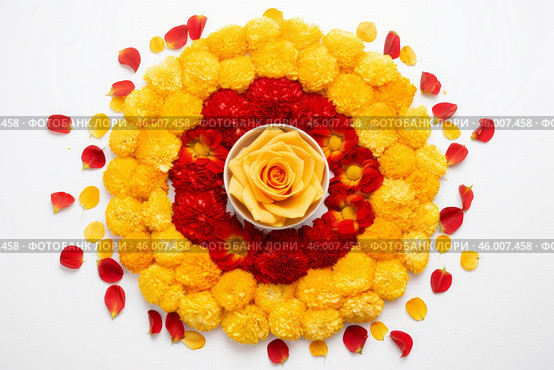 Beautiful and colorful flower rangoli decoration for diwali festival with a yellow rose in the center. Стоковое AI-изображение, AI-художник Иван Рябоконь / Фотобанк Лори