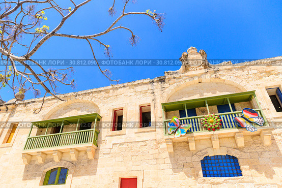 beautiful baroque building with bright doors and shutters built with sandstone (2019 год). Стоковое фото, фотограф Ирина Мойсеева / Фотобанк Лори
