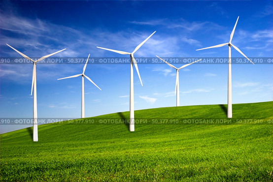 Beautiful green meadow with Wind turbines generating electricity. Стоковое фото, агентство Ingram Publishing / Фотобанк Лори