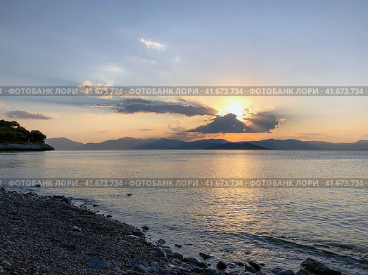 Beautiful sunset at the seaside, Greece. Редакционное фото, фотограф Екатерина Каляева / Фотобанк Лори
