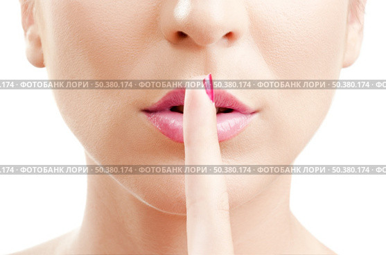 Beautiful young woman asking for silence. Стоковое фото, агентство Ingram Publishing / Фотобанк Лори