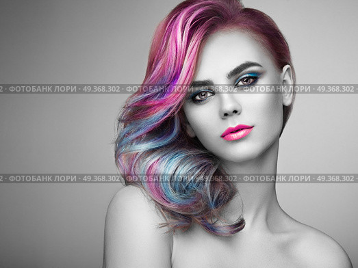 Beauty fashion model girl with colorful dyed hair. Beauty Fashion Model Girl with Colorful Dyed Hair. Girl with perfect Makeup and Hairstyle. Model with perfect Healthy Dyed Hair. Rainbow Hairstyles. Стоковое фото, агентство Ingram Publishing / Фотобанк Лори