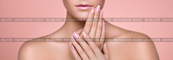 Beauty Woman with perfect Makeup and Manicure. Glamour Girl. Pink Lips and Nails. Skin care foundation. Beauty girls Face isolated on light Background. Fashion photo. Стоковое фото, агентство Ingram Publishing / Фотобанк Лори