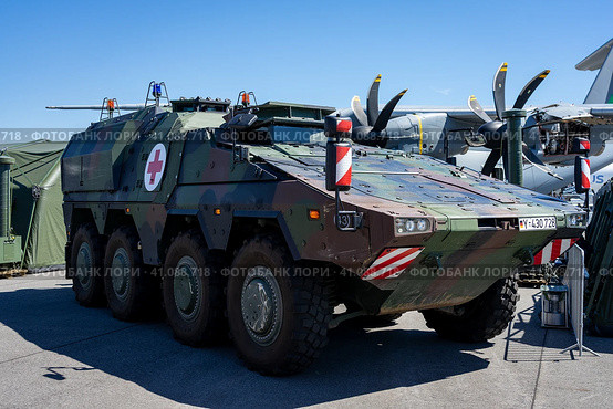 BERLIN, GERMANY - JUNE 23, 2022: Armoured fighting vehicle GTK Boxer BAT (medical transport). Exhibition ILA Berlin Air Show 2022. Редакционное фото, фотограф Sergey Kohl / Фотобанк Лори