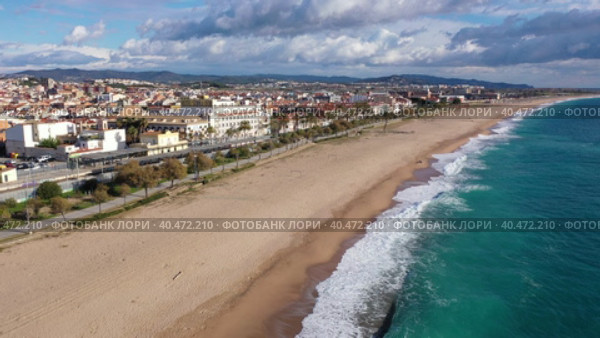 Bird's eye view of shoreline and beach of Malgrat de Mar, Spain. Стоковое видео, видеограф Яков Филимонов / Фотобанк Лори