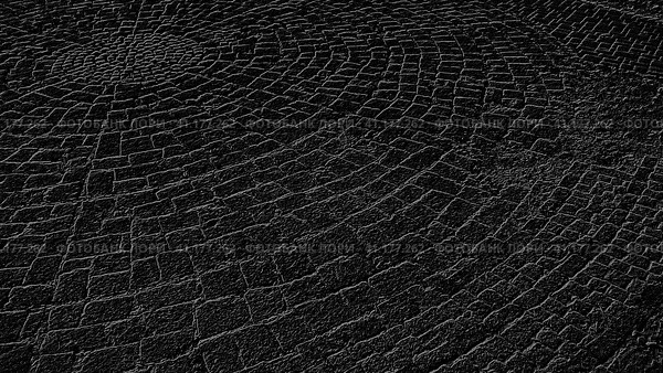Black and gray background, reminiscent of a cobblestone street in the old town. Circular pattern. Стоковая иллюстрация, иллюстратор Юлия Петровская / Фотобанк Лори