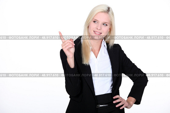 Blond businesswoman pointing. Стоковое фото, агентство Ingram Publishing / Фотобанк Лори
