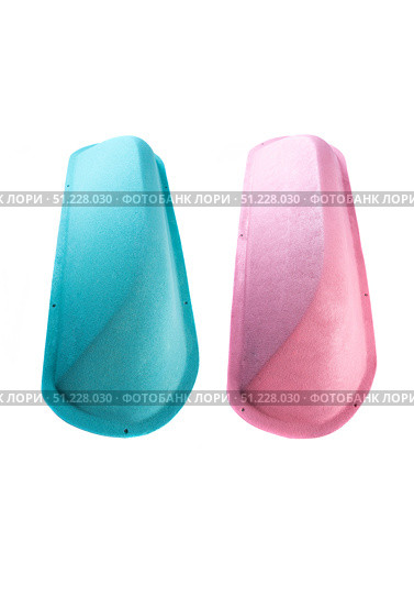 Blue and pink climbing holds with textured surface isolated on white background, designed for indoor rock climbing walls and training setups. Стоковое фото, фотограф Татьяна Терехина / Фотобанк Лори