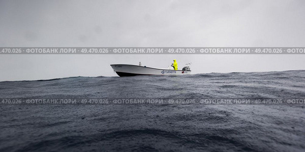 Boat in the sea, Joe’s Wall, Turneffe Atoll, Belize Barrier Reef, Belize. Стоковое фото, агентство Ingram Publishing / Фотобанк Лори