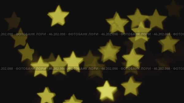Боке в форме звёзд. Мигающие огоньки на чёрном фоне. Праздничный, абстрактный фон. Стоковое видео, видеограф Семён Прудий / Фотобанк Лори