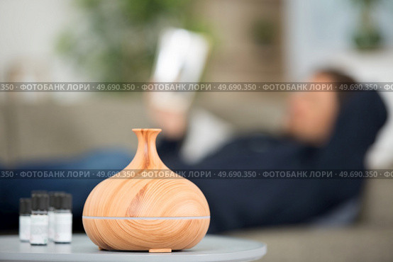 bottles with organic essential aroma oil for aromatherapy. Стоковое фото, агентство Ingram Publishing / Фотобанк Лори