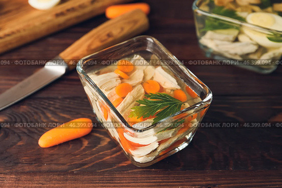 Bowl of tasty aspic on table. Стоковое фото, фотограф Pixel_shot / Фотобанк Лори