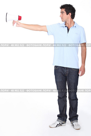 Boy using a megaphone. Стоковое фото, агентство Ingram Publishing / Фотобанк Лори