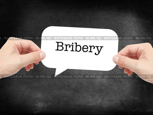 Bribery written on a speechbubble. Стоковое фото, агентство Ingram Publishing / Фотобанк Лори