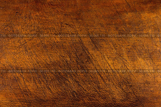 Brown scratched wooden cutting board. Wood texture. Стоковое фото, агентство Ingram Publishing / Фотобанк Лори