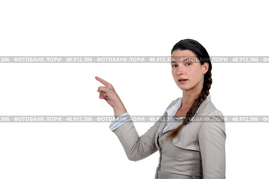 Brunette pointing. Стоковое фото, агентство Ingram Publishing / Фотобанк Лори