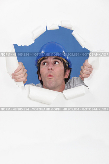 Builder realizing he has made a mistake. Стоковое фото, агентство Ingram Publishing / Фотобанк Лори