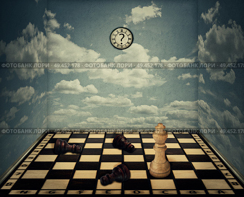 Business idea as a magical room with a chess board floor surrounded by the walls with clouds texture as limitations and the king piece winning in front of beaten pawns laying down. Victory concept. Стоковое фото, агентство Ingram Publishing / Фотобанк Лори