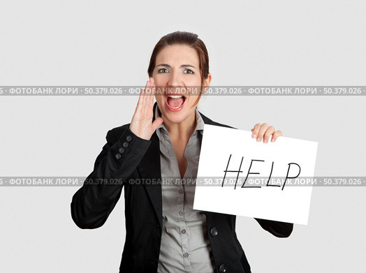 Business woman calling for help holding a cardboard with the text message "Help" Стоковое фото, агентство Ingram Publishing / Фотобанк Лори