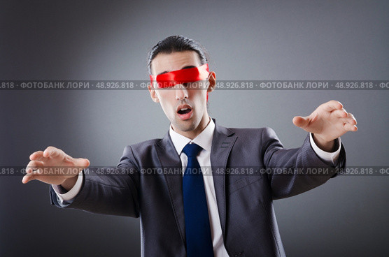 Businessman blinded by red tape. Стоковое фото, агентство Ingram Publishing / Фотобанк Лори