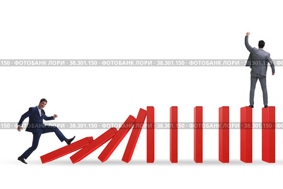 Businessman in domino effect concept. Стоковое фото, фотограф Elnur / Фотобанк Лори