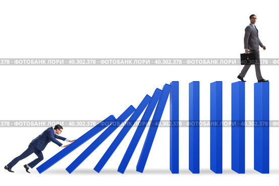 Businessman in domino effect concept. Стоковое фото, фотограф Elnur / Фотобанк Лори